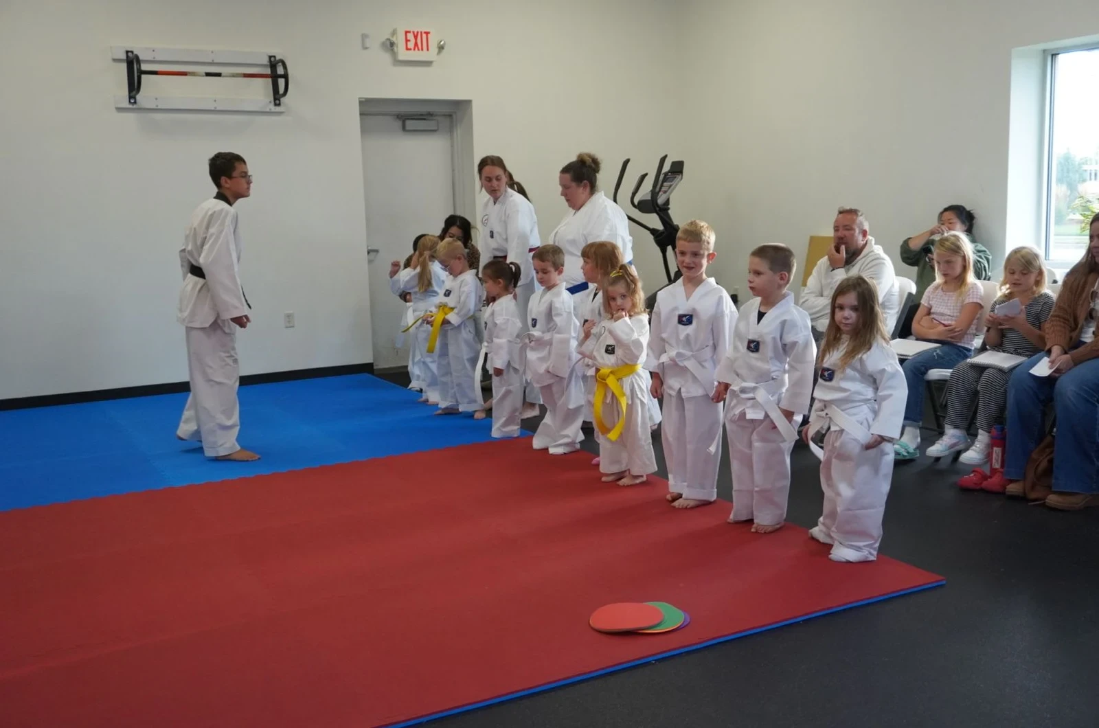 Kids learning sportsmanship through martial arts