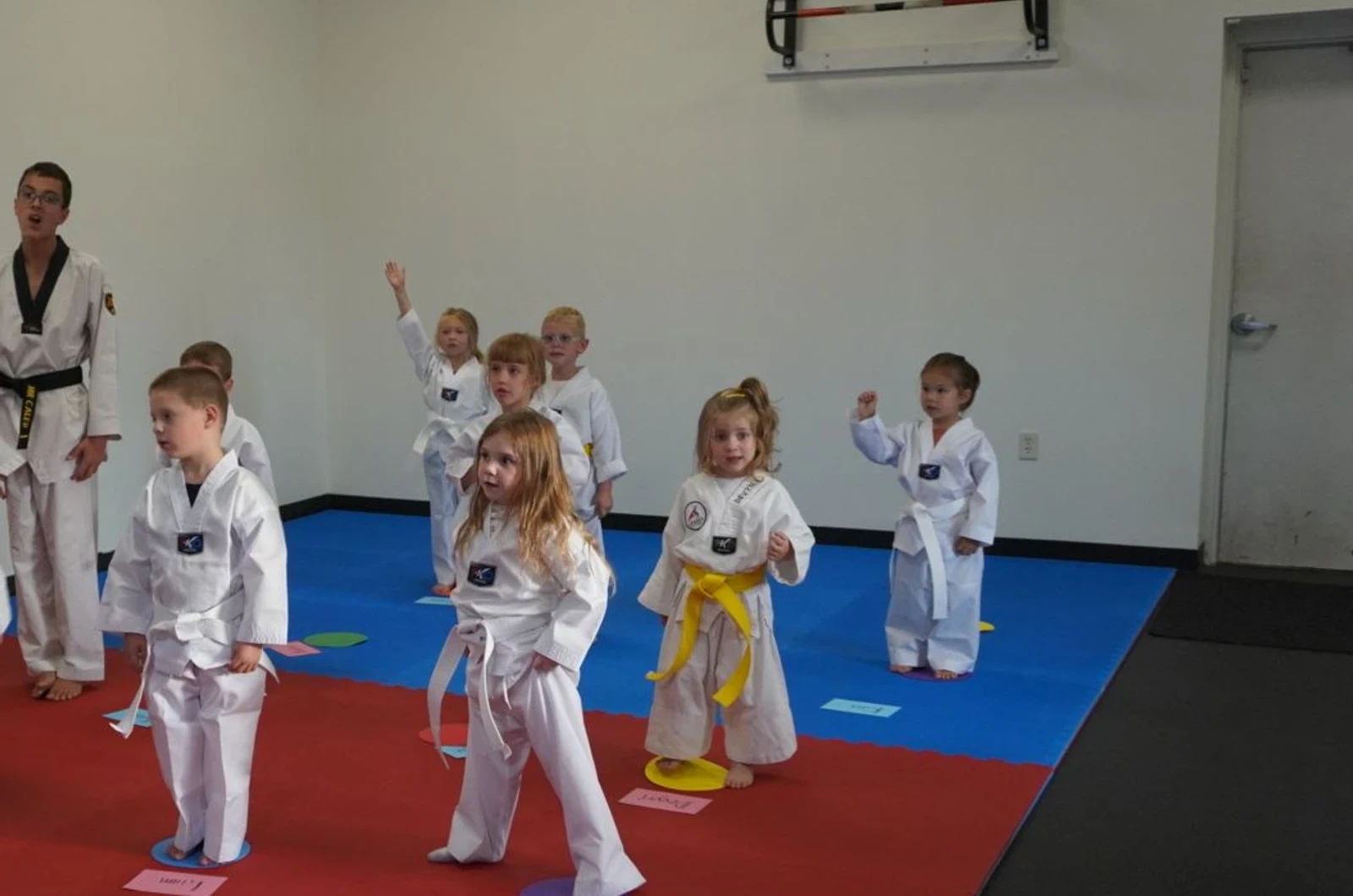 Child building confidence in martial arts